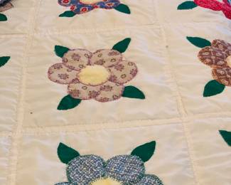 quilt three appliqued flowers