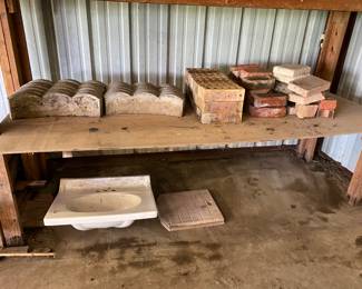 Some bricks and a sink for sale 