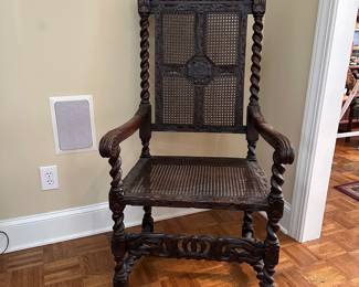 F15 - $175. Single Antique Carved High Back Arm Chair. Single Caned Seat and back. Structurally sound! 