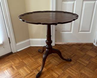 F9 - $85. Tilt Top Pie Crust Table. Measures 28" round x 28.5" tall. 