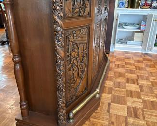 F14 - $750. Hand carved bar. Measures 22.5" deep x 6' wide x 43" tall. Brass foot rest across the bottom. Marble and Leather top. Needs minor repair to door on backside (new screws/wood glue to hold a hinge). Otherwise very good vintage condition. From China or Thailand. BUY IS RESPONSIBLE FOR MOVING. 