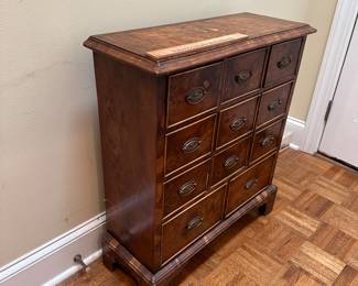 F2 - $275. UK Chemist Apothecary Cabinet. 11 drawers with burled veneer. Measures 10.25" deep x 26.5" wide x 30" tall. All drawers slide. Burled 8 drawer Apothecary Cabinet. Measures 18" deep x 34.5" wide x 32" tall. All drawers slide. 