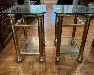 F94 - $125. Pair of Brass & Glass Side Tables. Measures 18" x 24" x 27" tall. 