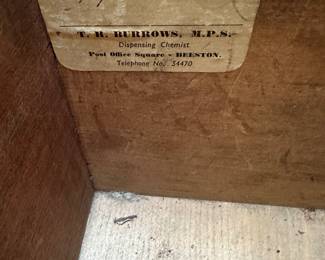 F2 - $275. UK Chemist Apothecary Cabinet. 11 drawers with burled veneer. Measures 10.25" deep x 26.5" wide x 30" tall. All drawers slide. 