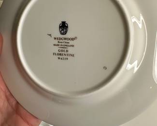 F23 - $550. Wedgwood Bone China "Gold Florentine" W4219. 60 pieces (12 - 5pc place settings)