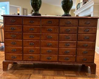F90 - $550. 30 drawer Apothecary Cabinet. Measures 13" deep x 52.5" wide x 32" tall. 