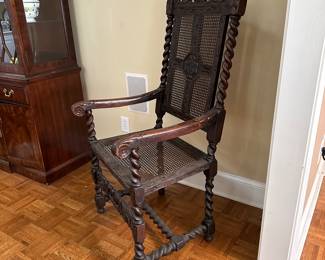 F15 - $175. Single Antique Carved High Back Arm Chair. Single Caned Seat and back. Structurally sound! 