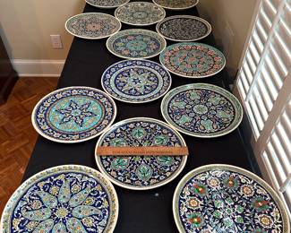 F13 - $25 each. 15 available. Wall hanging plates signed Cini. All slightly different patterns. 