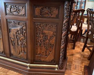 F14 - $750. Hand carved bar. Measures 22.5" deep x 6' wide x 43" tall. Brass foot rest across the bottom. Marble and Leather top. Needs minor repair to door on backside (new screws/wood glue to hold a hinge). Otherwise very good vintage condition. From China or Thailand. BUY IS RESPONSIBLE FOR MOVING. 