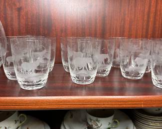 CP4 - $450. 22 Pieces. Rowland Ward Etched Crystal Safari Barware. 11.5" Decanter - Lion. 3.75" Glasses. 2 Giraffe, 3 Water Buffalo , 3 Rhino, 4 Lion, 4 Elephants, 4 Gazelle, 1 - 5.75" Lion Wine Glass. 