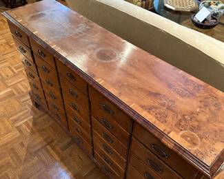 F90 - $550. 30 drawer Apothecary Cabinet. Measures 13" deep x 52.5" wide x 32" tall. 