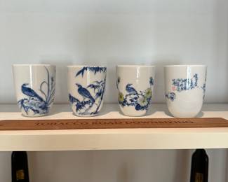 F40 - $20 - set of 4 painted cups. 