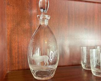 CP4 - $450. 22 Pieces. Rowland Ward Etched Crystal Safari Barware. 11.5" Decanter - Lion. 3.75" Glasses. 2 Giraffe, 3 Water Buffalo , 3 Rhino, 4 Lion, 4 Elephants, 4 Gazelle, 1 - 5.75" Lion Wine Glass. 