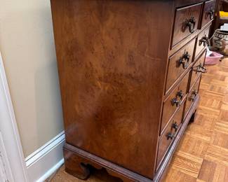 F53 - $350. Burled 8 drawer Apothecary Cabinet. Measures 18" deep x 34.5" wide x 32" tall. All drawers slide. 