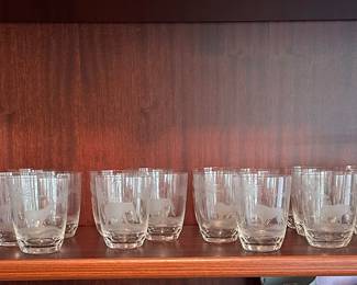 CP4 - $450. 22 Pieces. Rowland Ward Etched Crystal Safari Barware. 11.5" Decanter - Lion. 3.75" Glasses. 2 Giraffe, 3 Water Buffalo , 3 Rhino, 4 Lion, 4 Elephants, 4 Gazelle, 1 - 5.75" Lion Wine Glass. 