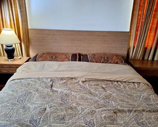 Adjustable King size bed with two full size mattresses, bed sheet, comforter, pillows, two bed side tables and table lamp. Make an offer. Highest offer gets it!