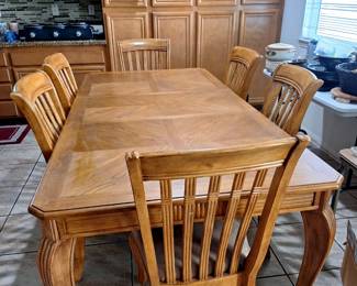 Dining table with six dining chairs. 