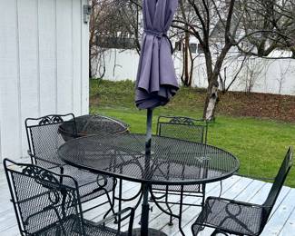 Wrought Iron table 54” Rnd x 29”h w/ 4 chairs, Umbrella & Stand $250