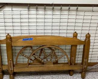 Wagon wheel vintage twin head, foot boards & metal spring mattress base $50. (2) available