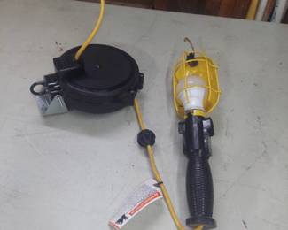 Shop light with cord reel