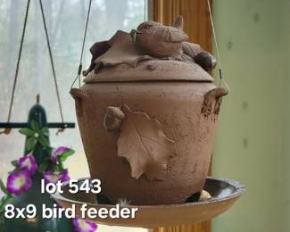 Pottery hanging bird feeder