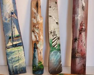 Hand painted lighthouses on wood pieces