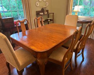 Dining table with 3 leaves and pads and 6 Queen Anne chairs 
42d x 62L x 30.5h
$1500