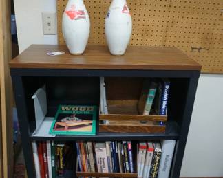 book shelf, books, bowling pins