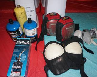 propane bottles, knee pads, breathing apparatus