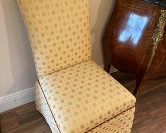 One of a pair of skirted upholstered side chairs