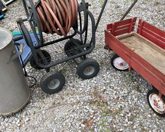 Old wagon smoker and portable hose reel 