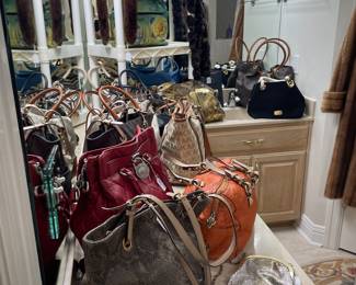 Counter of Michael Kors purses some new and like new