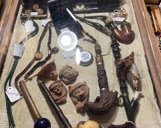 Collection of old pipes, Victorian hair mourning fob chains and pre Colombian heads