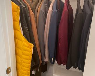 Men’s Coats , jackets and suits in Mid Century bedroom closet 