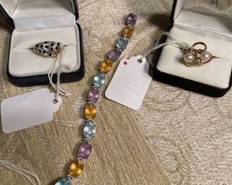 18K diamond , ruby and onyx leopard ring, 14K and pearl ring with 14K white gold topaz, aquamarine and amethyst bracelet 