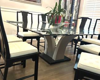 6’ by 6’ square glass top table with chrome pedestal base & 8 chairs 