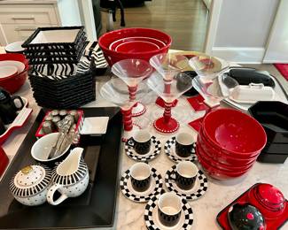Lots of red, white, & black dishes and accessories