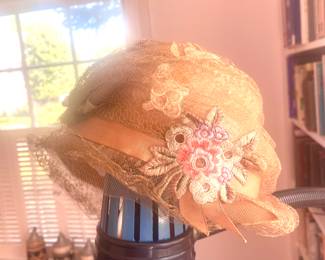 Lace and embroidery hand-made hat. Worn by bride in Denmark in 1928.