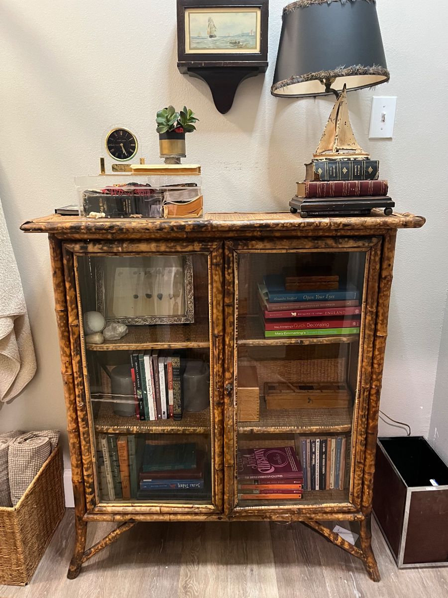 SOLDBurnt bamboo cabinet with glass doors
