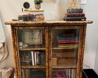 SOLDBurnt bamboo cabinet with glass doors