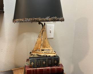Cast iron sailboat lamp with book base