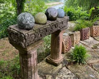 The header and columns with spheres overlooking the Brazos River. The spheres will be at the register table and will be sold separately.