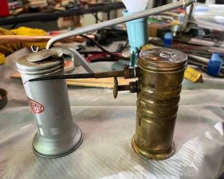 Vintage pump oil cans