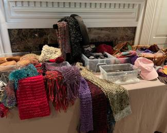 Lots of hand made scarves and hats, socks, wood shoe horns, gloves, small coin purses