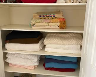 Sheets, blankets, bathmats, pillows, and linen hand towels