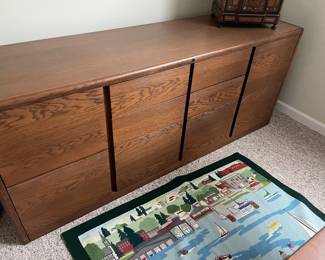 Credenza with file drawers and needlepoint rug
