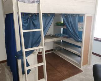 Loft bed with desk below