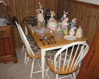 small table and chairs, some easter decor on top