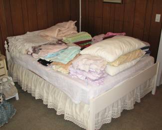 bed with linens