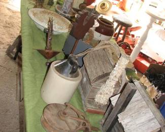 several tables full in the garage